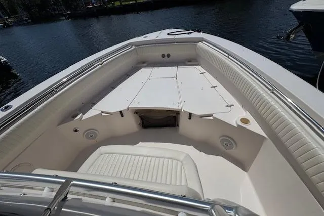  Yacht Photos Pics 2007 Grady-White Bimini 306 boat interior with cushioned seating and storage compartments.