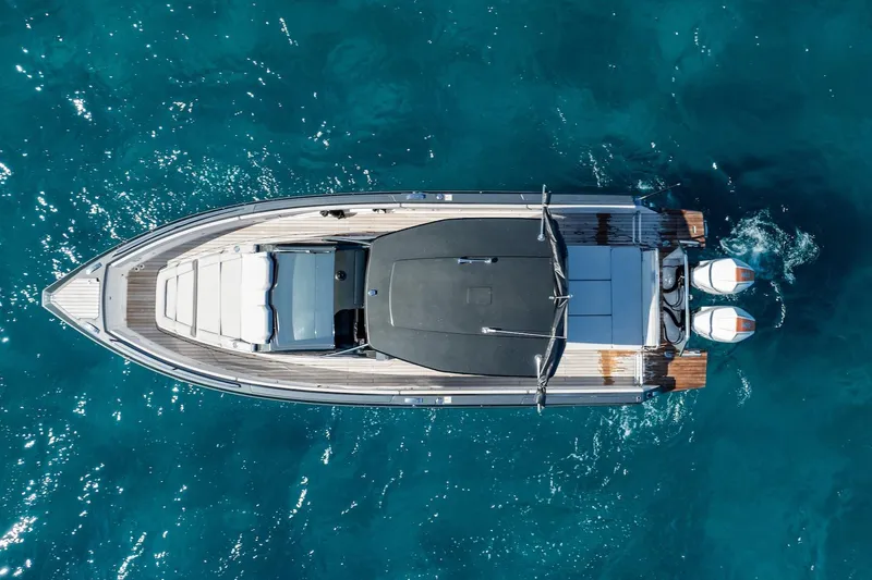  Yacht Photos Pics Top view of 2024 Schaefer V33 yacht on clear blue water.