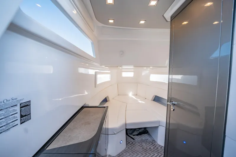  Yacht Photos Pics Luxurious interior of 2024 Schaefer V33 yacht with modern design and ambient lighting.