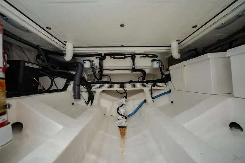  Yacht Photos Pics 2024 Schaefer V33 boat interior showing engine compartment and wiring layout.