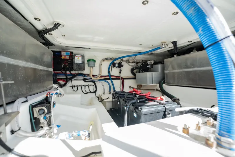  Yacht Photos Pics 2024 Schaefer V33 engine compartment showcasing batteries and wiring.