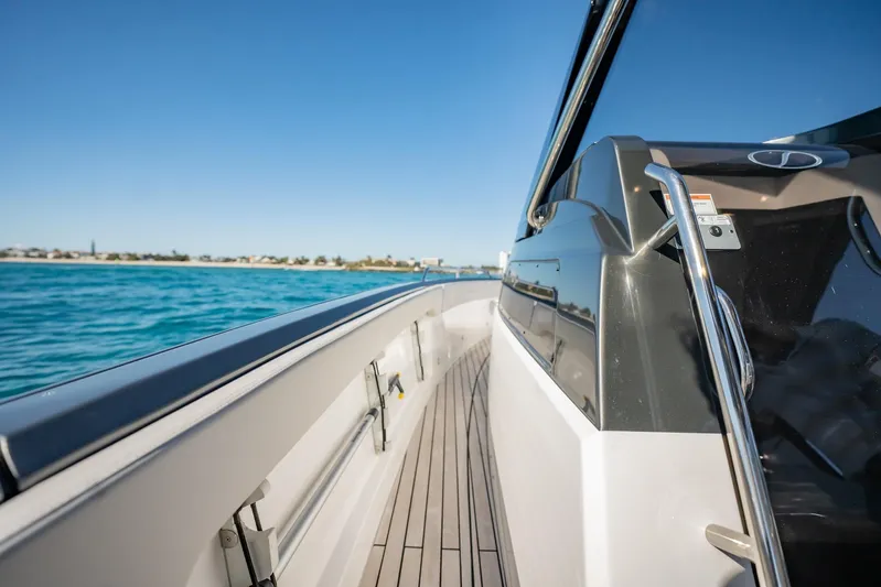  Yacht Photos Pics 2024 Schaefer V33 yacht deck with sleek design and ocean view.