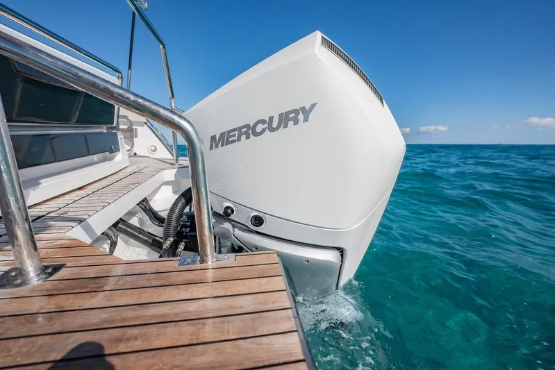  Yacht Photos Pics 2024 Schaefer V33 boat with Mercury engine on clear blue ocean.