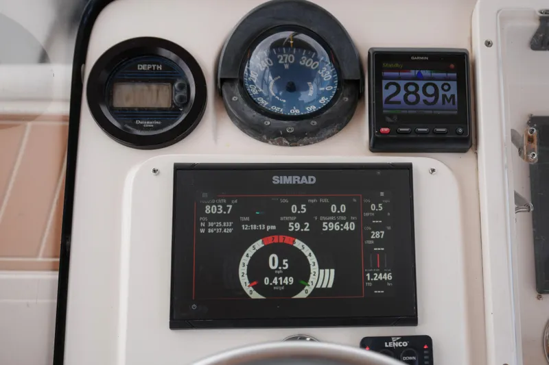  Yacht Photos Pics 1999 Intrepid 366 boat dashboard with Simrad navigation and depth instruments.
