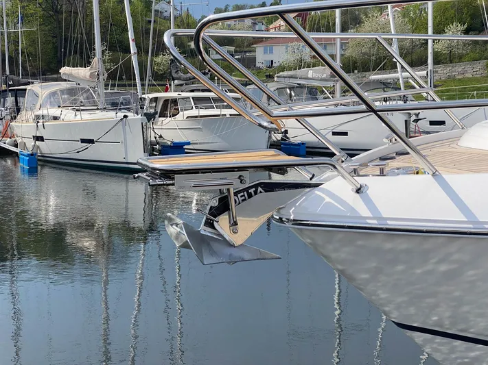 V40157 Yacht Photos Pics 2023 Princess V40 yacht docked in marina, featuring sleek design and modern amenities.