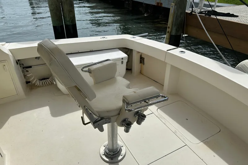  Yacht Photos Pics 1990 Viking 43 Convertible boat deck with fishing chair and rod holders.