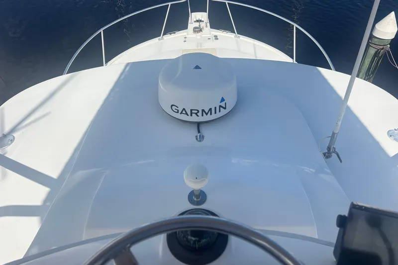 Distraction Yacht Photos Pics 2004 Luhrs 32 Open boat with Garmin navigation system on deck.