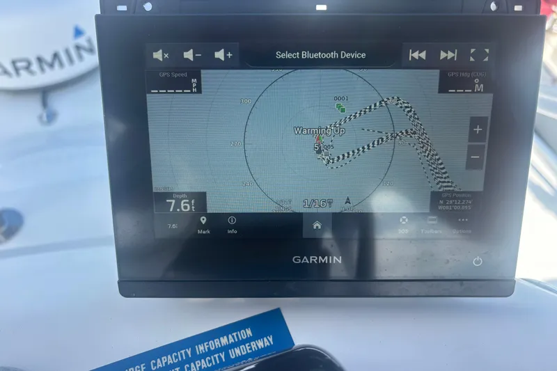 Distraction Yacht Photos Pics Garmin marine GPS display on 2004 Luhrs 32 Open boat, showing navigation data.