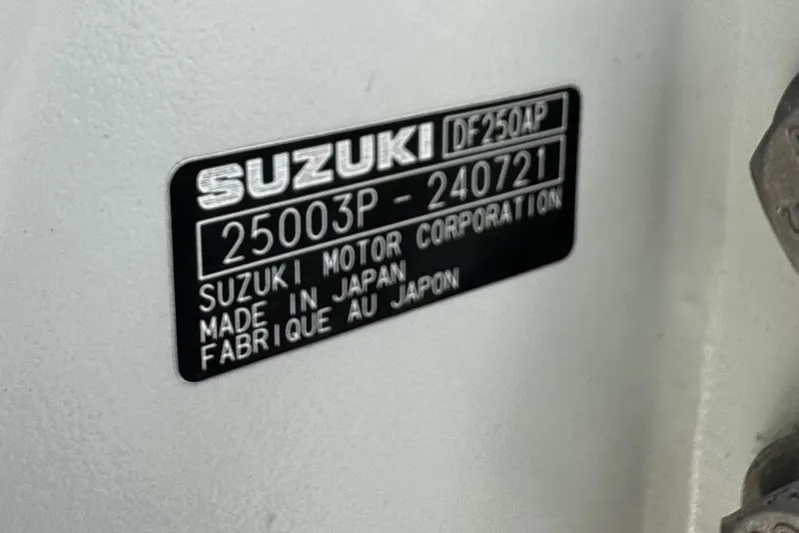  Yacht Photos Pics Suzuki motor label on 2022 Whitewater 28 Open, made in Japan.