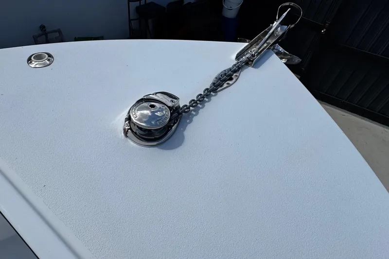  Yacht Photos Pics 2022 Whitewater 28 Open boat deck with anchor chain and winch.