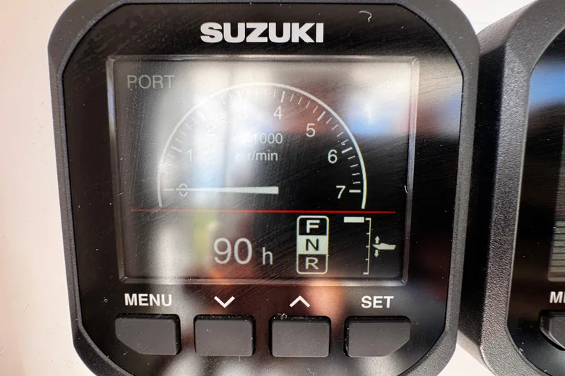  Yacht Photos Pics Suzuki engine display showing 90 hours on a 2022 Whitewater 28 Open boat.