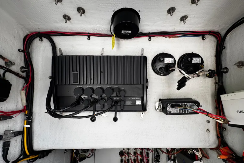  Yacht Photos Pics Electrical system of a 2022 Whitewater 28 Open boat, featuring wiring and components.
