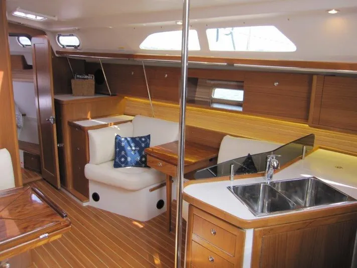 Hurkle Durkle Yacht Photos Pics Interior of 2024 Catalina 385 sailboat with wood finish and modern amenities.