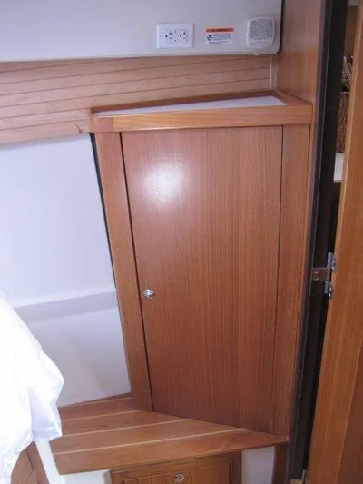 Hurkle Durkle Yacht Photos Pics 2024 Catalina 385 interior with wooden cabinetry and modern design.