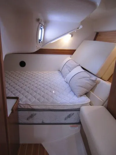 Hurkle Durkle Yacht Photos Pics 2024 Catalina 385 yacht cabin with cozy bed and cushions.