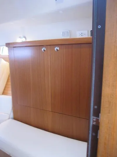 Hurkle Durkle Yacht Photos Pics 2024 Catalina 385 interior with wooden cabinetry and seating.