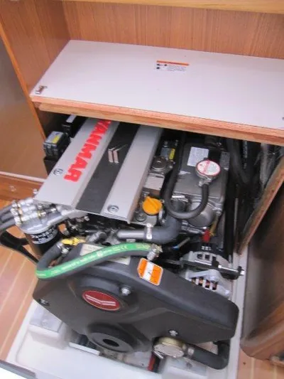 Hurkle Durkle Yacht Photos Pics 2024 Catalina 385 engine compartment with Yanmar engine, showcasing detailed components and layout.