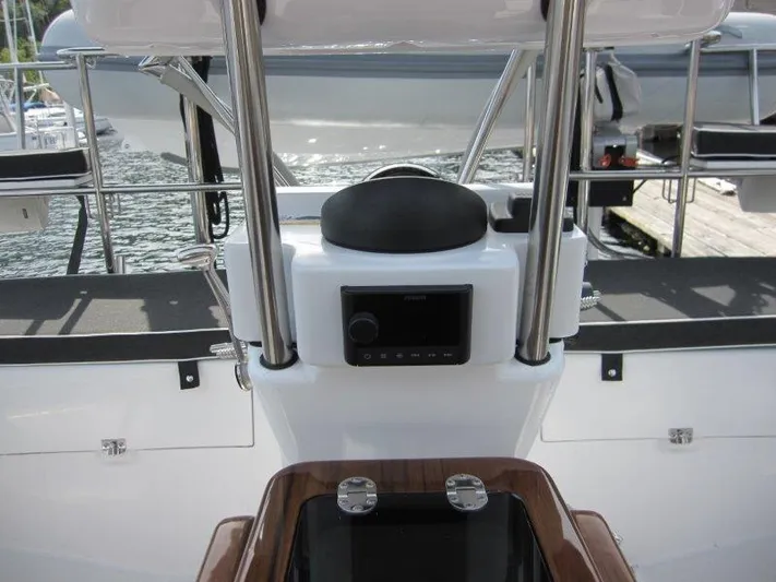 Hurkle Durkle Yacht Photos Pics 2024 Catalina 385 yacht helm with modern navigation equipment and sleek design.