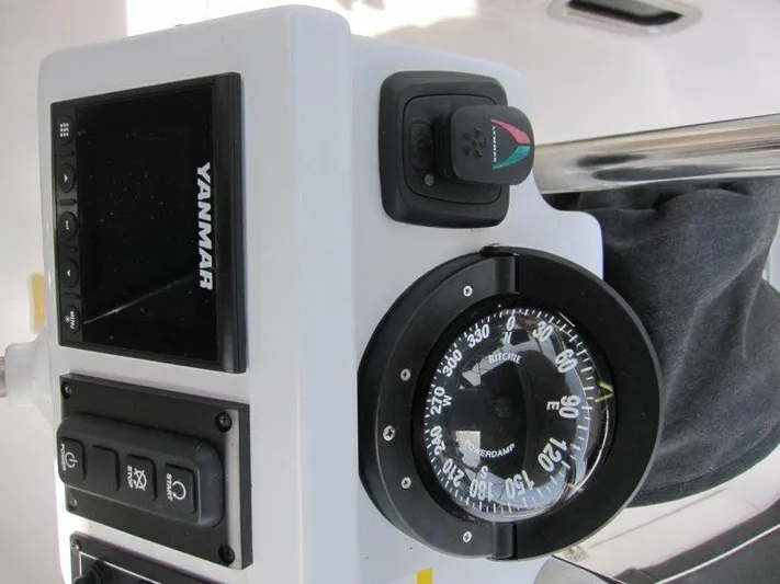 Hurkle Durkle Yacht Photos Pics Compass and control panel on 2024 Catalina 385 sailboat.