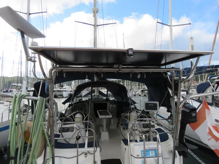  Yacht Photos Pics Jeanneau Sun Odyssey 40 sailboat, 2000 model, docked in a marina with clear skies.