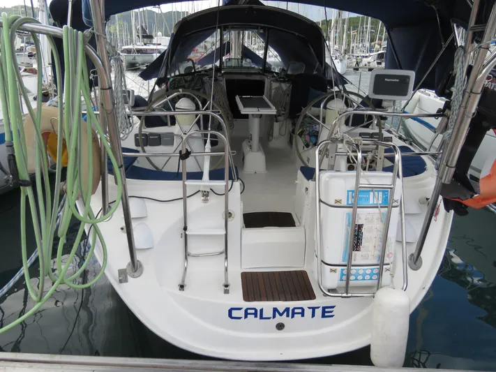  Yacht Photos Pics Jeanneau Sun Odyssey 40 sailboat, 2000 model, docked at marina, rear view.