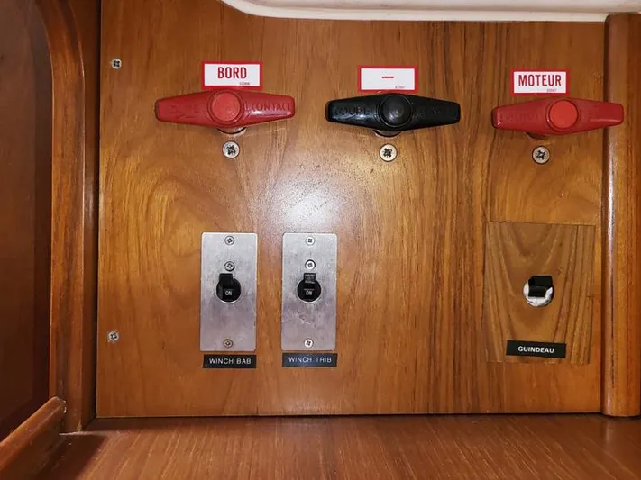  Yacht Photos Pics Control panel on a 2000 Jeanneau Sun Odyssey 40 sailboat with switches and labels.