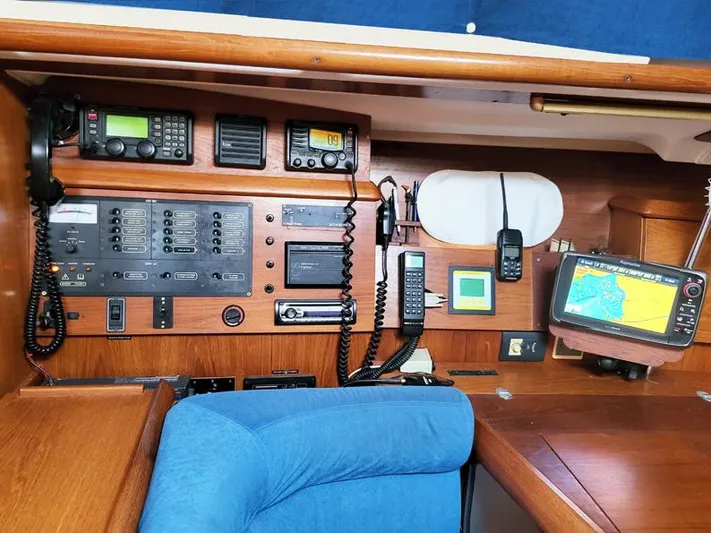 Yacht Photos Pics Navigation and communication equipment inside a 2000 Jeanneau Sun Odyssey 40 sailboat cabin.