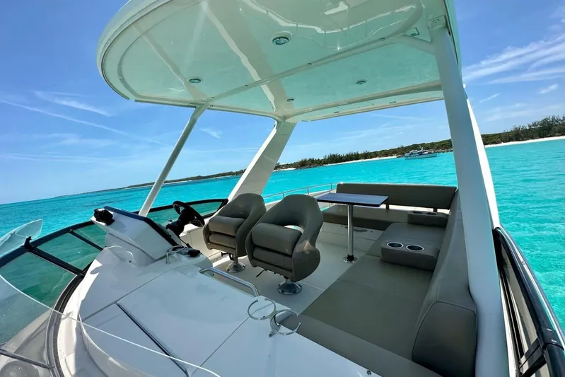 Saline Dion Yacht Photos Pics 2017 Carver C40 yacht interior with seating, table, and ocean view.