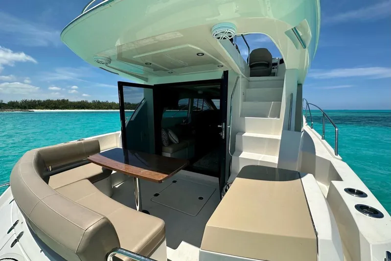Saline Dion Yacht Photos Pics Luxurious 2017 Carver C40 yacht with spacious deck, cruising on turquoise waters.