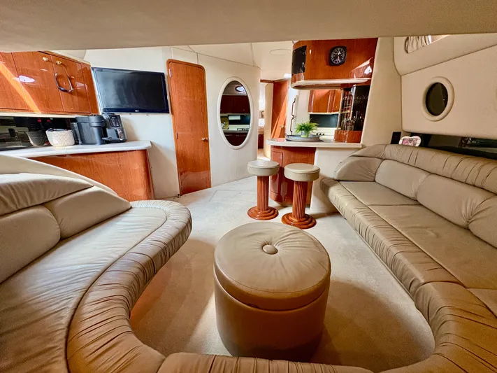 Top Gunns Yacht Photos Pics Luxurious interior of 1998 Sea Ray 500 Sundancer yacht with plush seating and modern amenities.