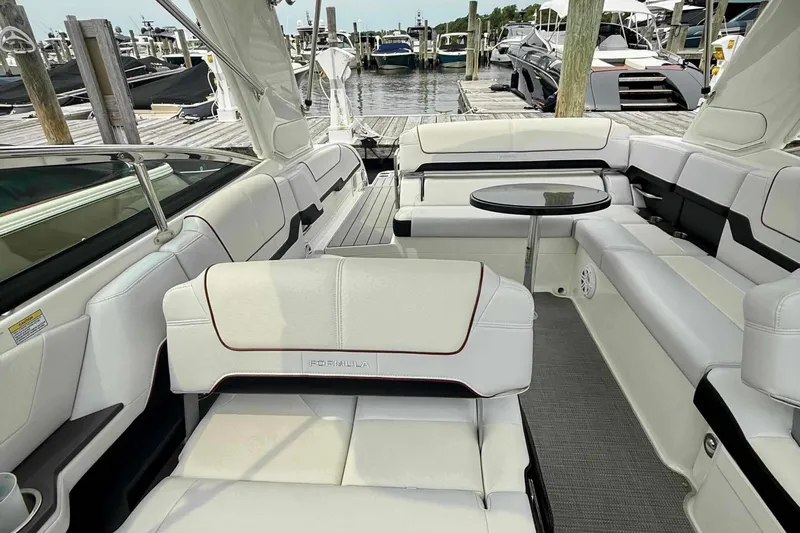  Yacht Photos Pics Luxurious interior of a 2020 Formula 290 Bowrider boat at a marina.