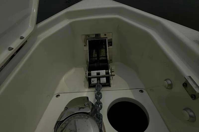  Yacht Photos Pics 2020 Formula 290 Bowrider anchor compartment with chain and winch system.