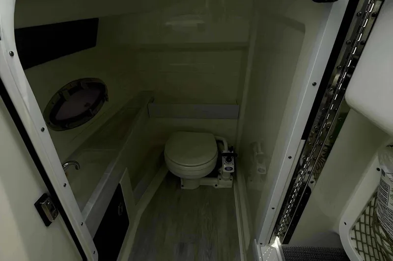  Yacht Photos Pics Interior of 2020 Formula 290 Bowrider boat bathroom with toilet and sink.