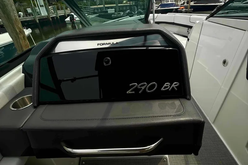  Yacht Photos Pics 2020 Formula 290 Bowrider dashboard with sleek design and cup holder.
