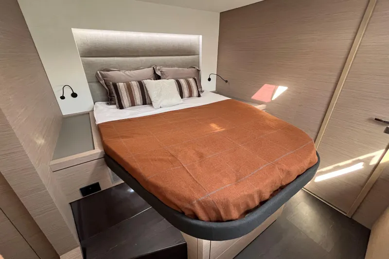  Yacht Photos Pics Luxurious bedroom interior of 2023 Fountaine Pajot Tanna 47 yacht.