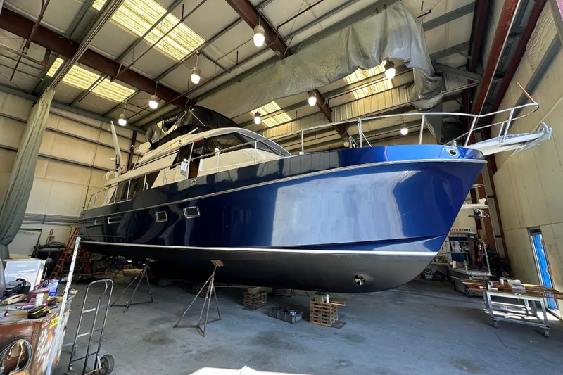 The Dude Yacht Photos Pics 1995 Ocean Alexander 486 yacht in a boatyard, undergoing maintenance.