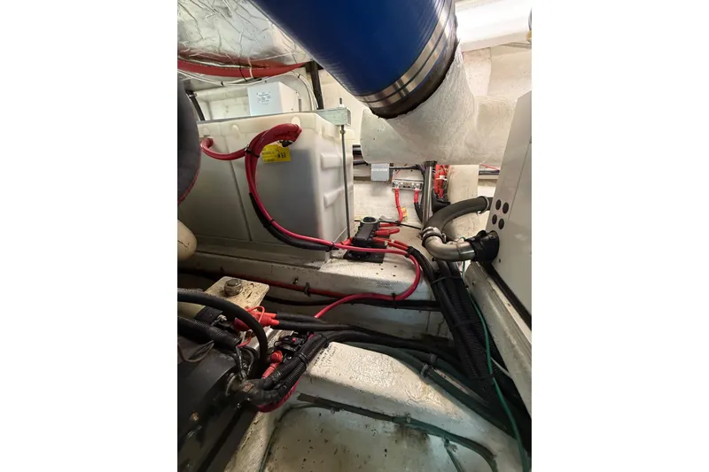 The Dude Yacht Photos Pics Engine room of 1995 Ocean Alexander 486 yacht with visible wiring and components.