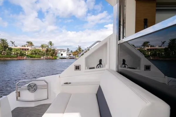  Yacht Photos Pics 2018 Cruisers Yachts 50 Cantius, luxurious seating area with waterfront view.