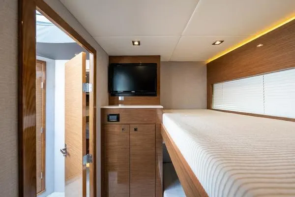  Yacht Photos Pics Interior of 2018 Cruisers Yachts 50 Cantius with bunk bed and TV.