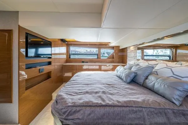  Yacht Photos Pics Luxurious bedroom interior of 2018 Cruisers Yachts 50 Cantius with modern amenities.