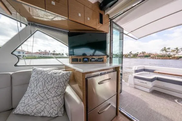  Yacht Photos Pics Interior of 2018 Cruisers Yachts 50 Cantius with modern amenities and waterfront view.