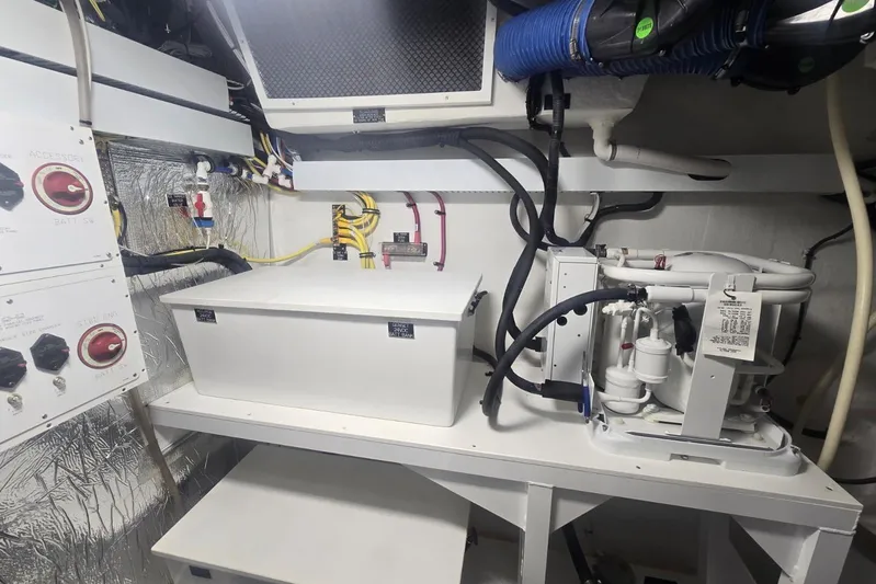  Yacht Photos Pics Engine room of 2018 Cruisers Yachts 50 Cantius with electrical and mechanical components.