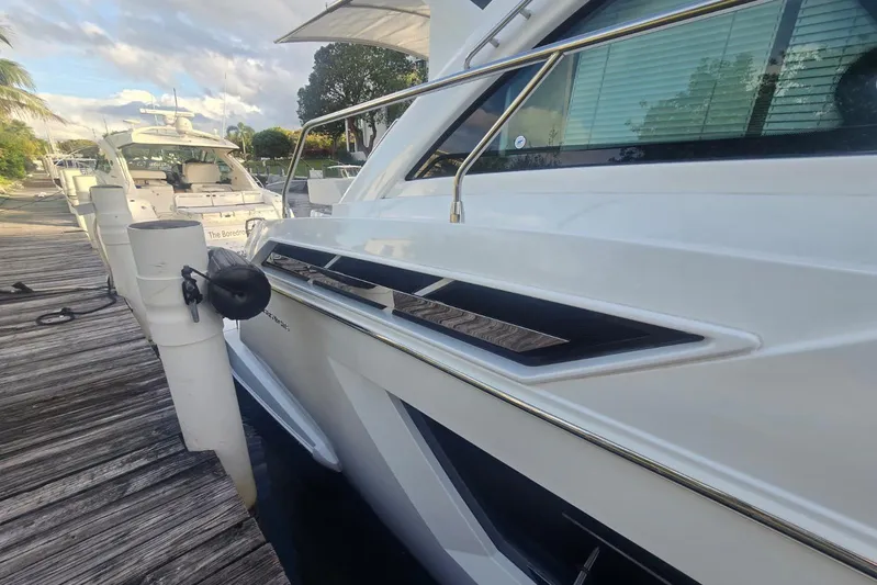  Yacht Photos Pics 2018 Cruisers Yachts 50 Cantius docked, showcasing sleek design and modern features.