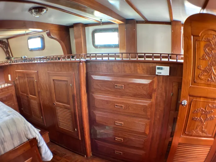 Whiskey River Yacht Photos Pics Interior of 1981 Island Trader 46 yacht with wooden cabinetry and drawers.