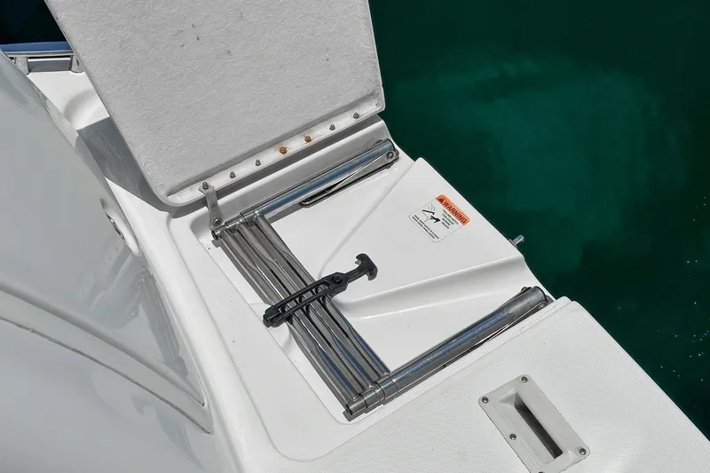 At Ease Yacht Photos Pics 2004 Silverton 39 Motor Yacht swim platform with foldable ladder.