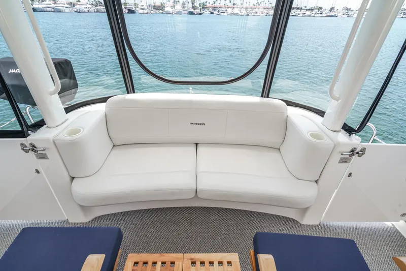 At Ease Yacht Photos Pics Luxurious seating area on 2004 Silverton 39 Motor Yacht with ocean view.