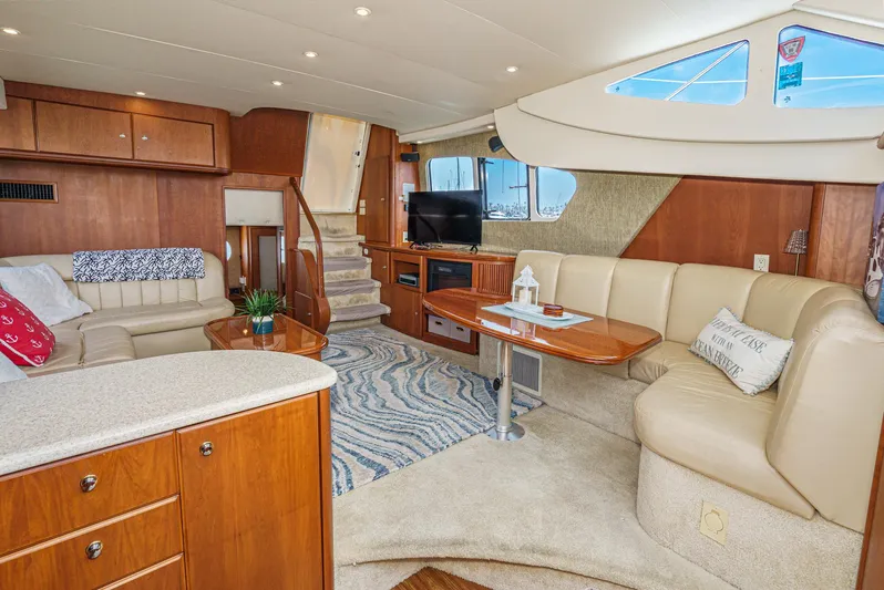 At Ease Yacht Photos Pics Luxurious interior of 2004 Silverton 39 Motor Yacht with plush seating and modern amenities.