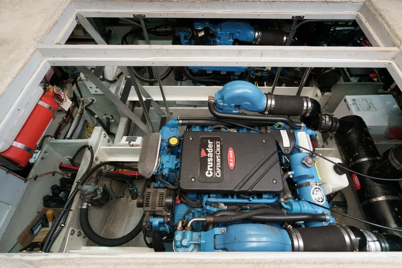 At Ease Yacht Photos Pics Engine room of a 2004 Silverton 39 Motor Yacht, featuring Crusader engines.