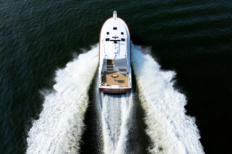 No Whey Yacht Photos Pics 2023 Henriques 42 Express Hardtop cruising on open water, aerial view.