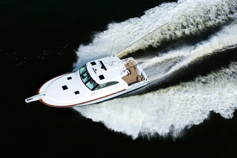 No Whey Yacht Photos Pics 2023 Henriques 42 Express Hardtop cruising on water, aerial view.